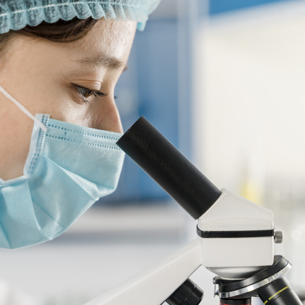 young female chemist close up